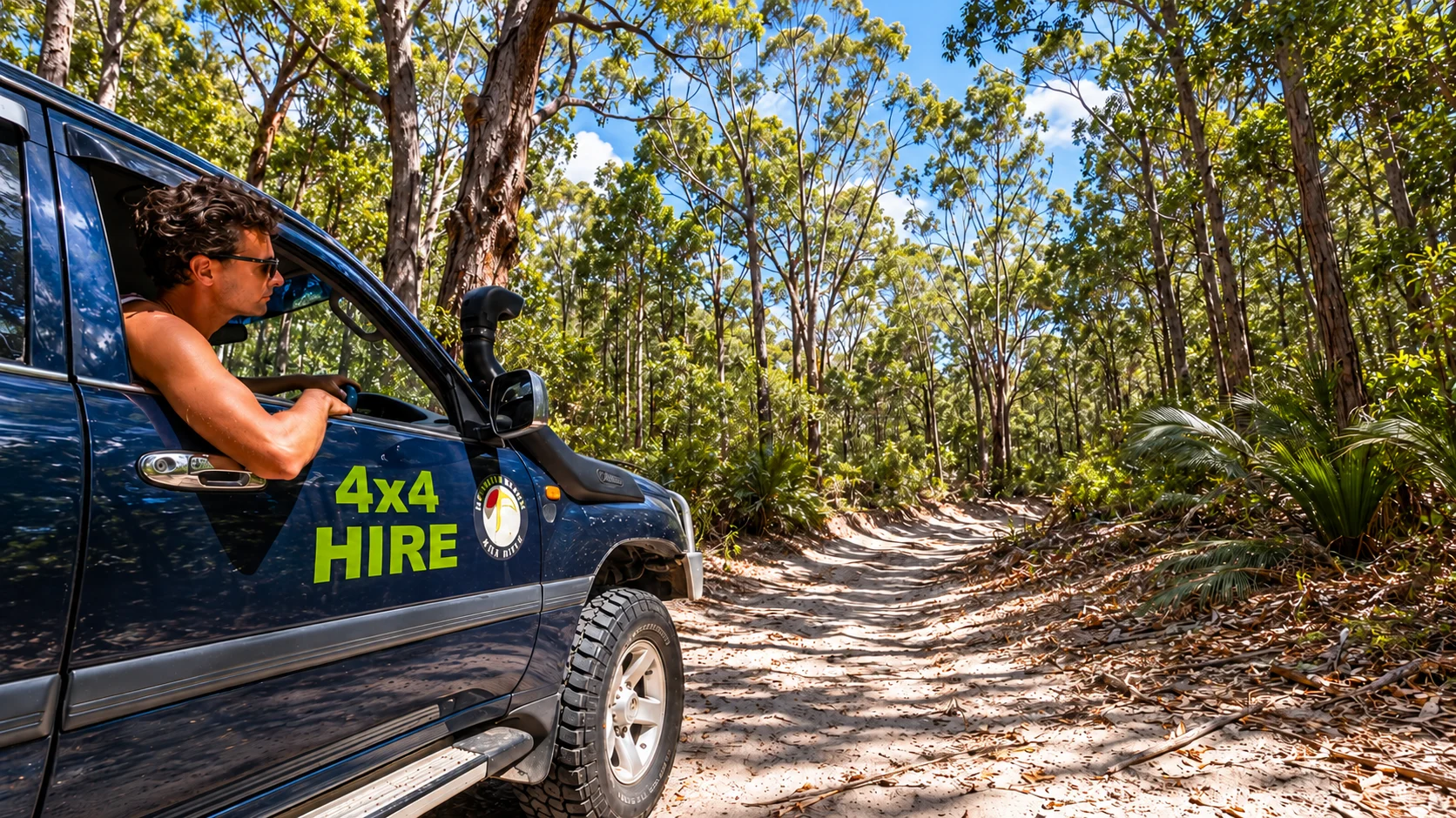 A Rainbow Beach 4x4 Hire Landcruiser on a forest track